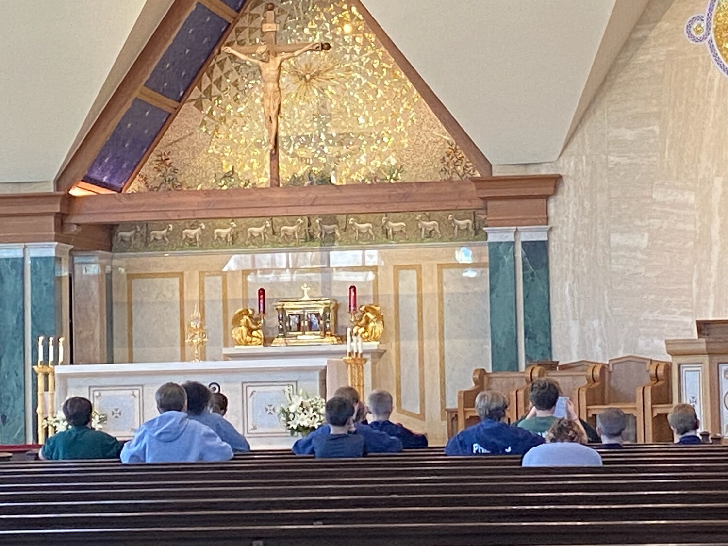 Students of St. Joseph Cathedral School in Jefferson City spend time in Adoration, praying for peace in the Cathedral during the Oct. 17 day of prayer and fasting for peace in the Holy Land.